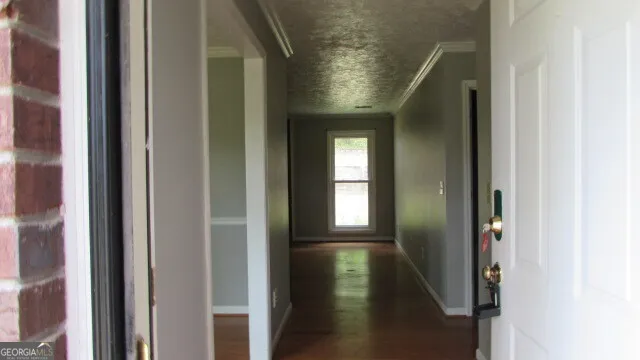 a view of entryway with a hallway