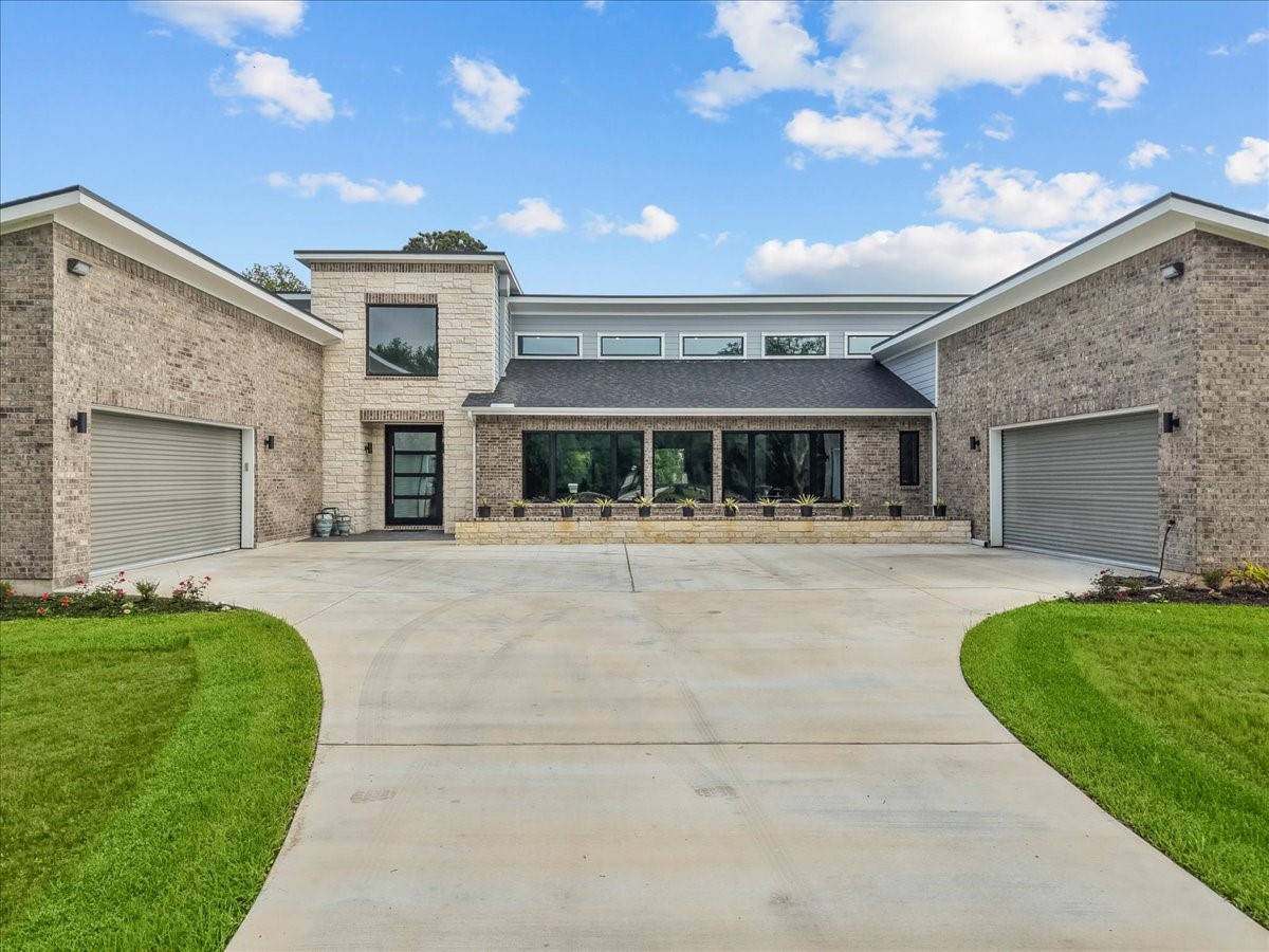 7627 Scott Avenue Manvel, TX 77578 - Photo 1 of 50 Welcome to 7627 Scott Ave.! Located just 20 mins to the Texas Medical Center. Custom built in 2025 to offer the highest level of luxury, privacy, and enjoyment.