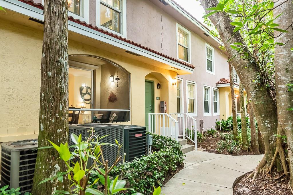 6944 West Sample Road, Unit 6944 Pompano Beach, FL 33063 - Photo 49 of 49 a view of a building entrance