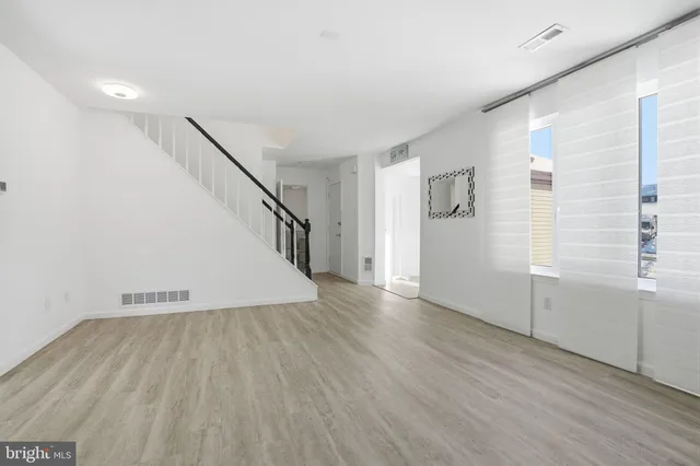 a view of entryway with wooden floor