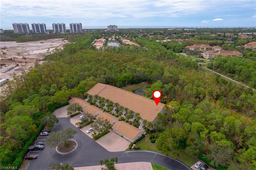 14565 Red Fox Run, Unit 613 Naples, FL 34110 - Photo 3 of 48 an aerial view of house with yard