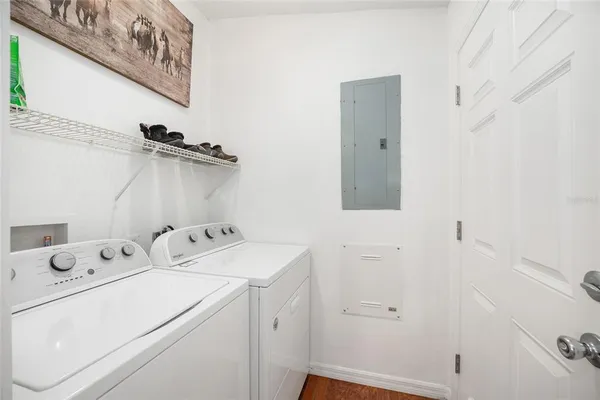a utility room with dryer and washer
