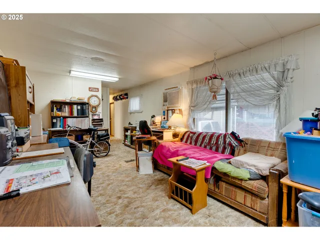 a room with a bed and a window