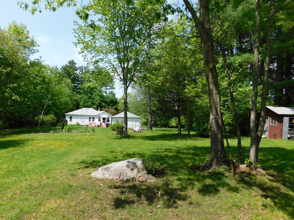 225 Rockingham Road Londonderry, NH 03053 - Photo 12 of 28 a garden view with a seating space