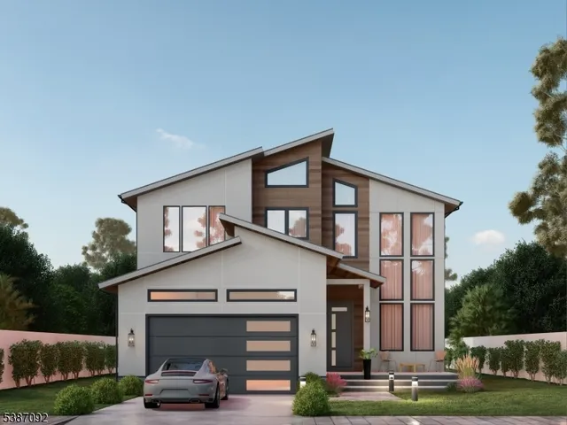 a view of a house with entrance gate