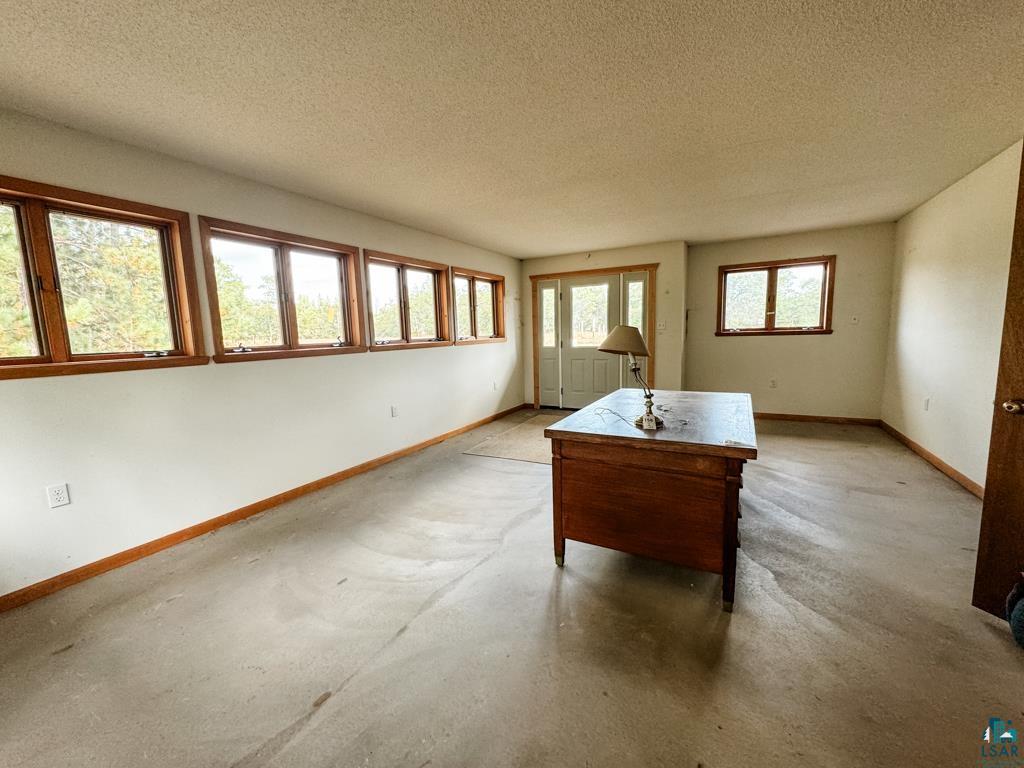 N13431 County Line Road Minong, WI 54859 - Photo 40 of 42 Misc room with a textured ceiling