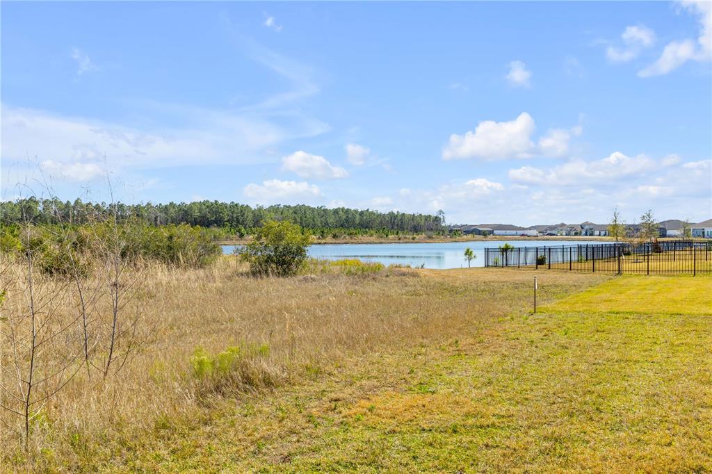 246 Azure Mist Way Daytona Beach, FL 32124 - Photo 27 of 33 a view of an ocean with city