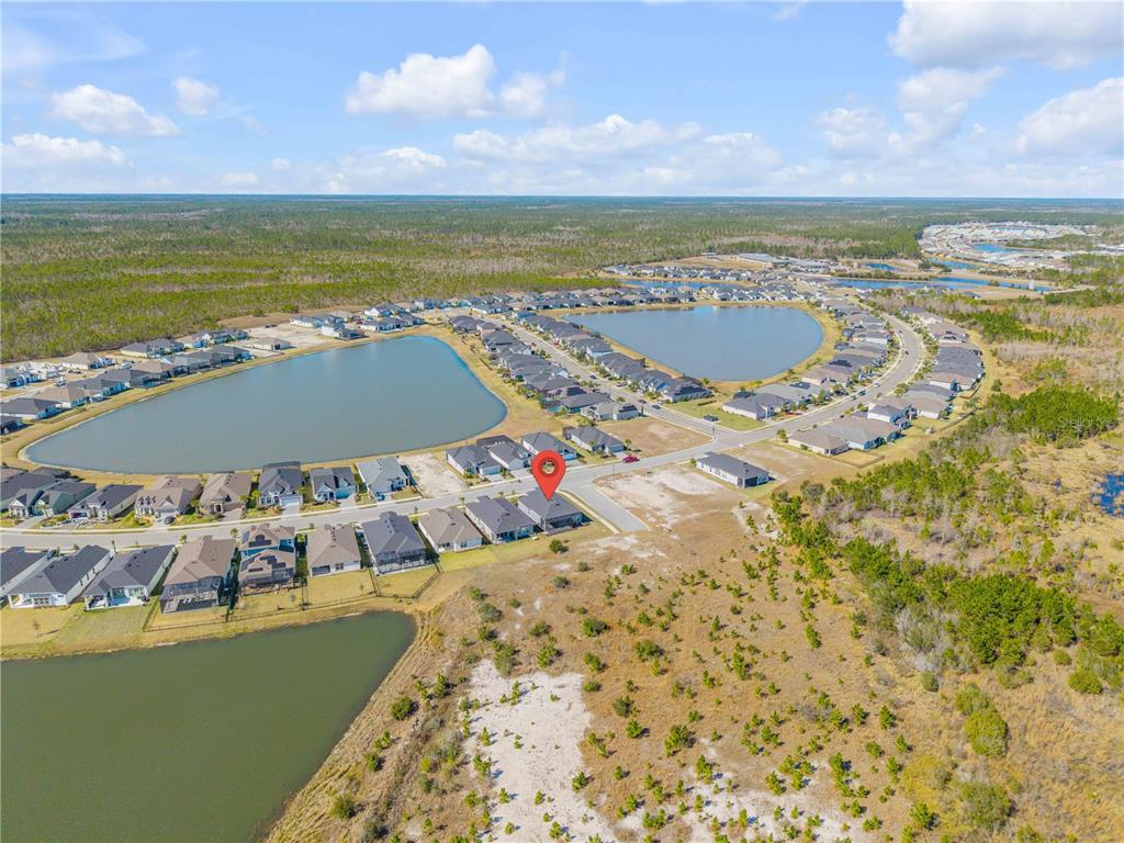 246 Azure Mist Way Daytona Beach, FL 32124 - Photo 33 of 33 a view of an ocean and beach