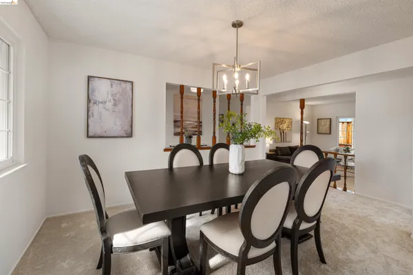 a bedroom with a bed and a chair