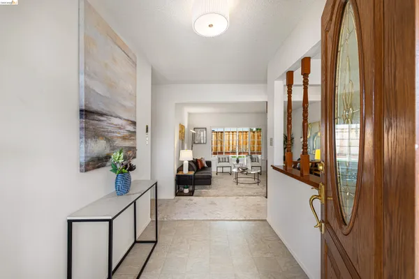 a kitchen with a stove and a refrigerator