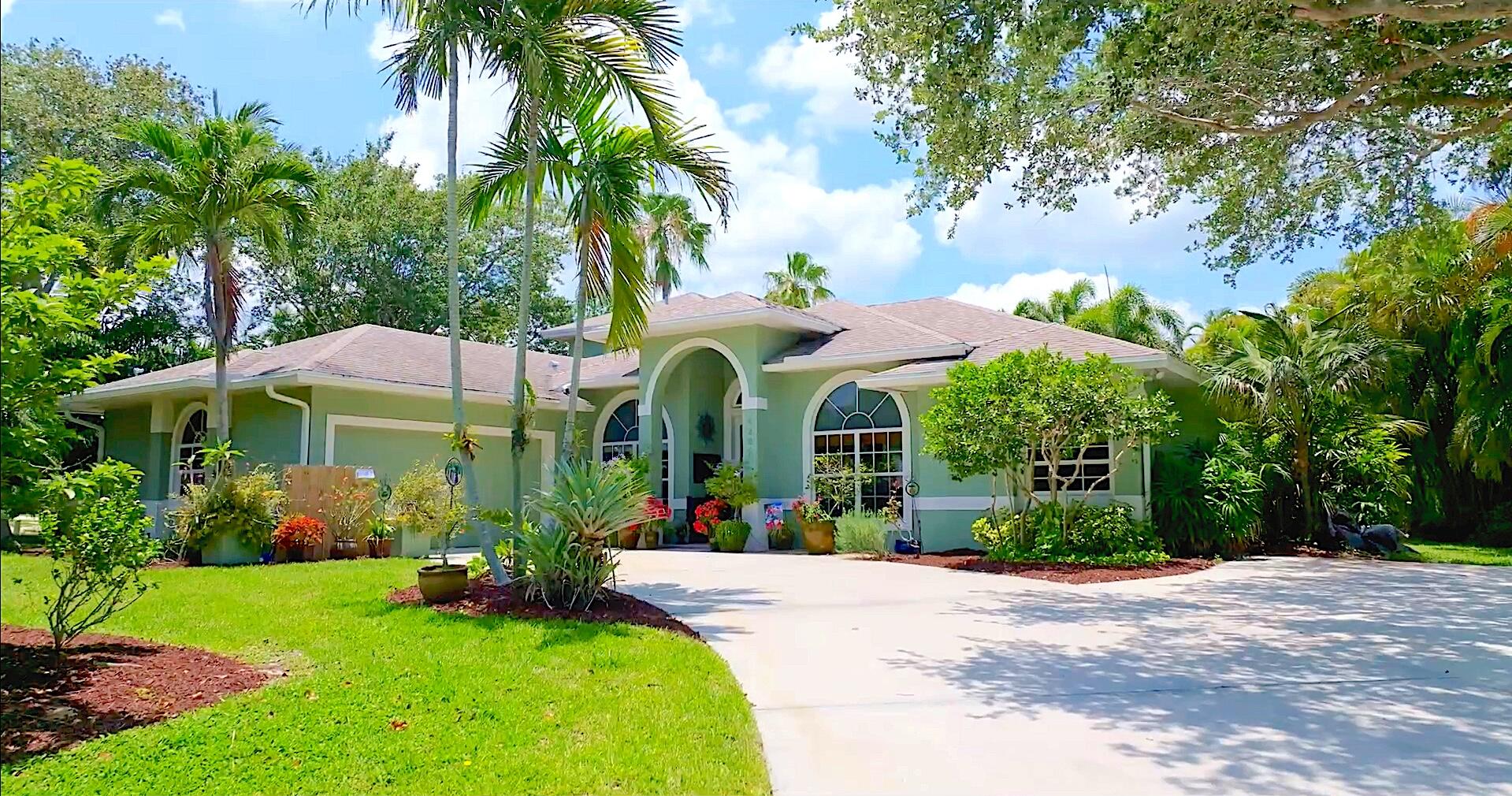 4292 Southeast Rainbows End Stuart, FL 34997 - Photo 4 of 56 Front Home 1