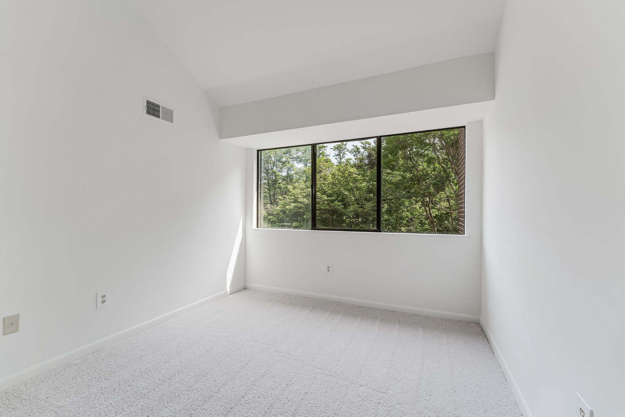 12023 Insha Court Reston, VA 20191 - Photo 35 of 52 a view of an empty room with a window