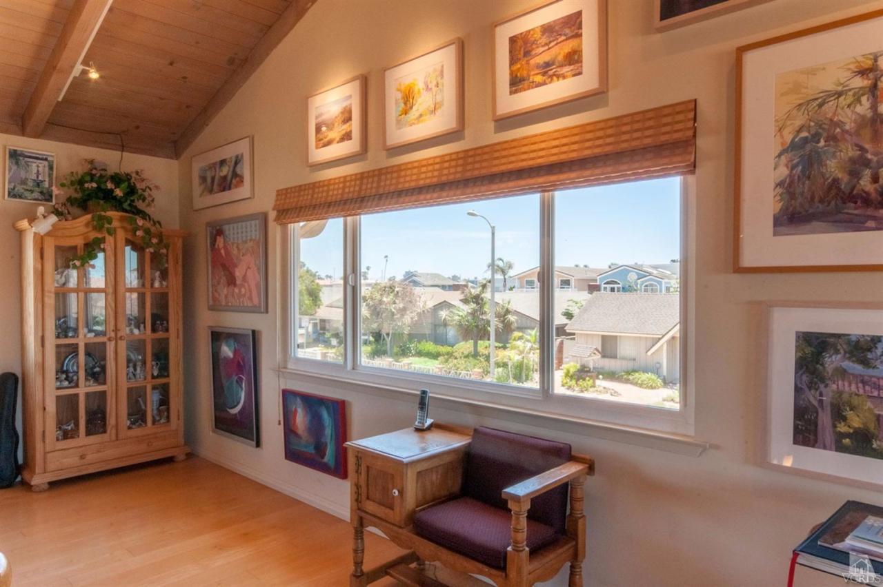 5241 Beachcomber Street Oxnard, CA 93035 - Photo 12 of 21 a view of a livingroom with furniture and windows