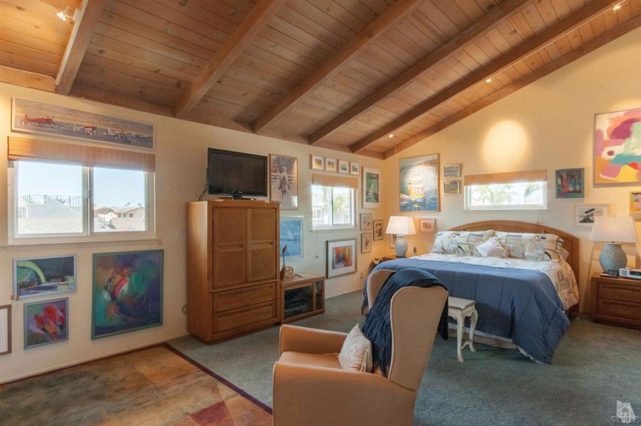 5241 Beachcomber Street Oxnard, CA 93035 - Photo 14 of 21 a bedroom with furniture and a window