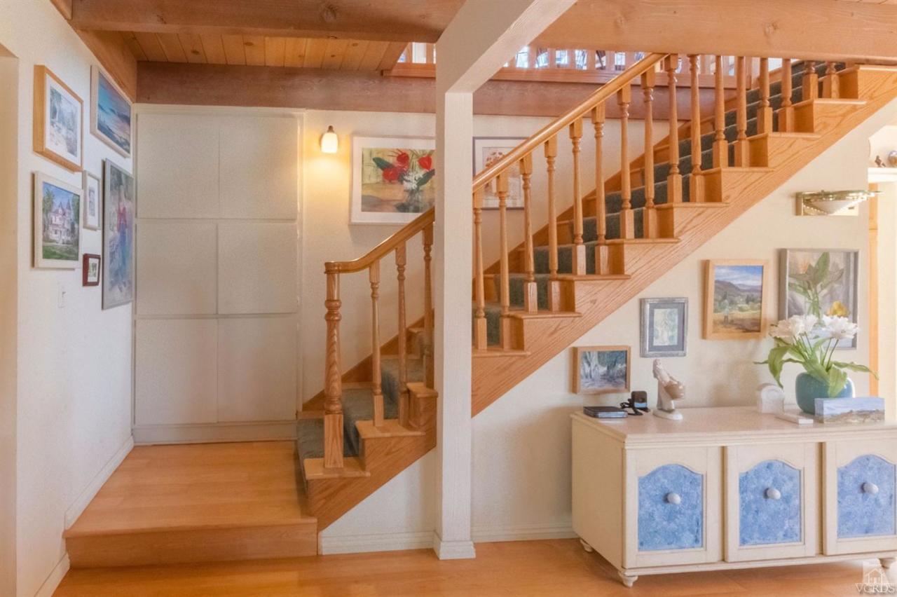 5241 Beachcomber Street Oxnard, CA 93035 - Photo 9 of 21 a view of entryway and hall with wooden floor