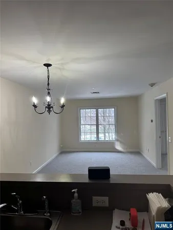 a room with furniture and window