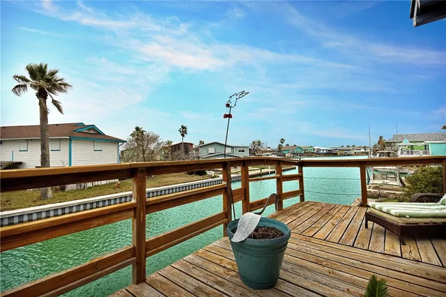 a view of a balcony with chairs