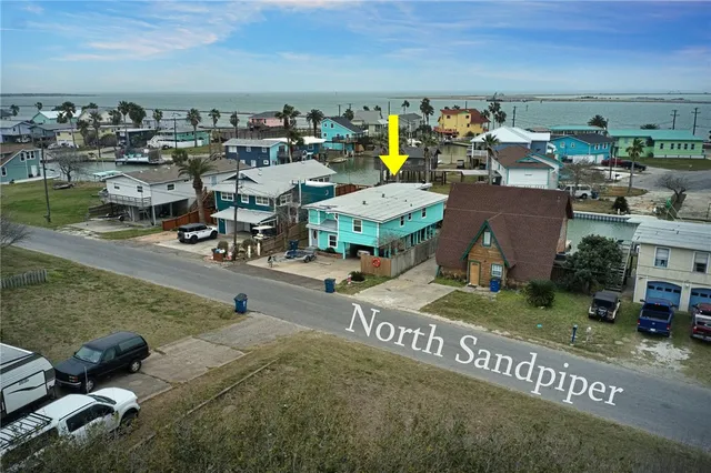 a storage room filled with lots of fruit and furniture