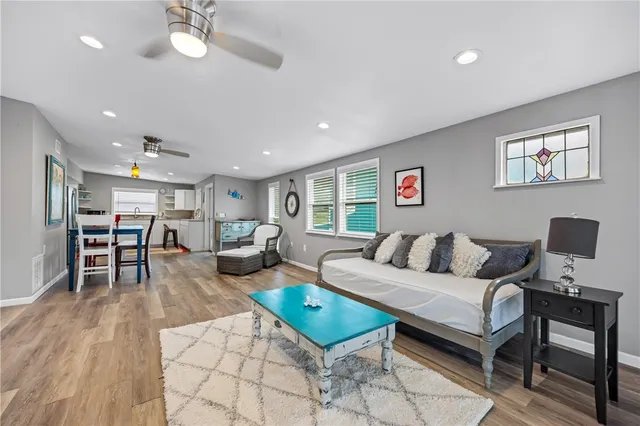 a living room with furniture and a table