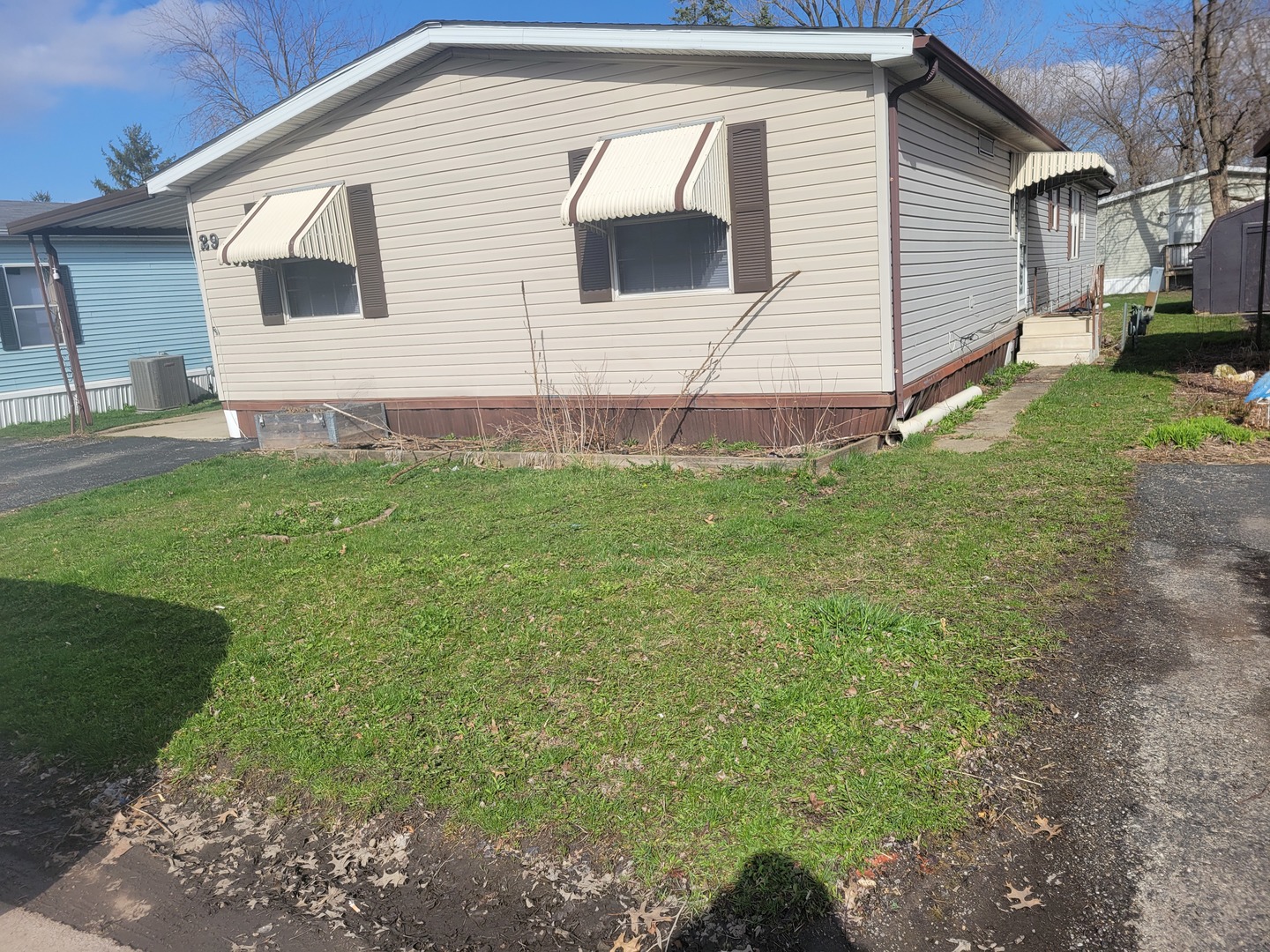 29 Cherry Lane Bourbonnais, IL 60914 - Photo 3 of 7 a view of a backyard of the house