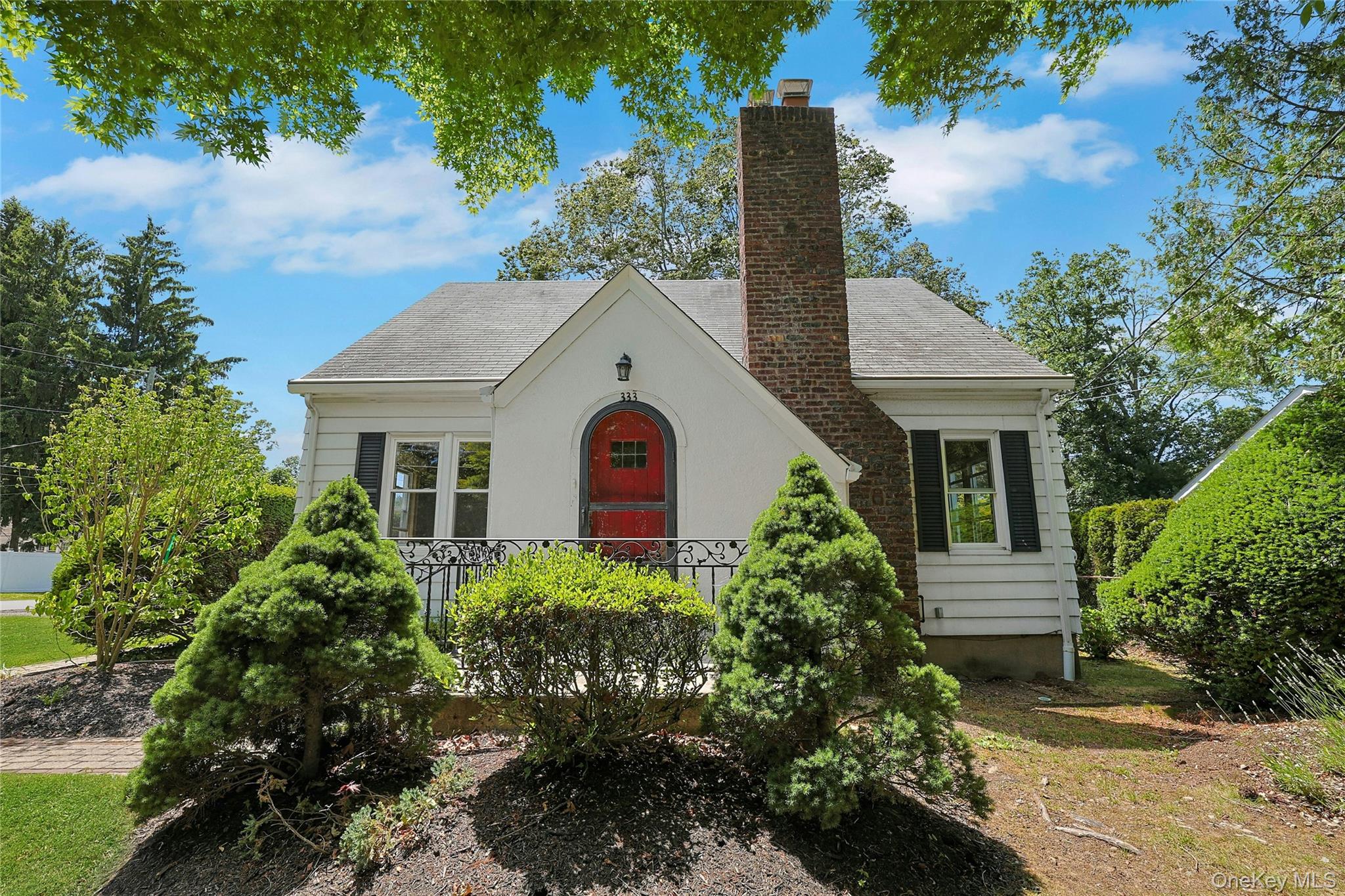 333 South Middletown Road Nanuet, NY 10954 - Photo 3 of 22 a front view of a house with a yard