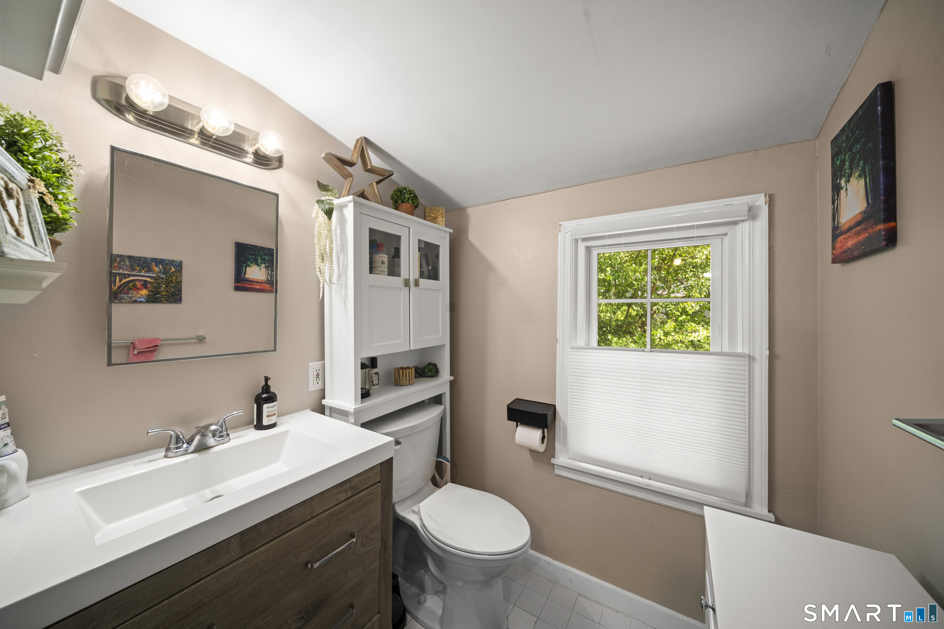 211 Whisconier Road Brookfield, CT 06804 - Photo 25 of 38 a bathroom with a granite countertop sink toilet and mirror