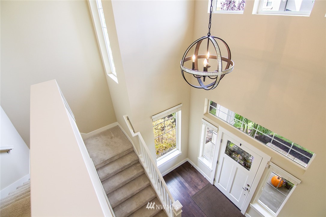 3924 185th Place Southeast Bothell, WA 98012 - Photo 13 of 25 a view of an entryway with wooden floor