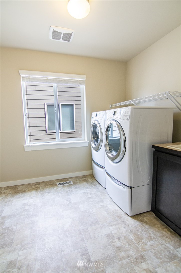 3924 185th Place Southeast Bothell, WA 98012 - Photo 20 of 25 a utility room with dryer and washer