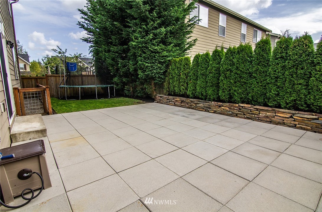 3924 185th Place Southeast Bothell, WA 98012 - Photo 25 of 25 a view of backyard with seating space and trees