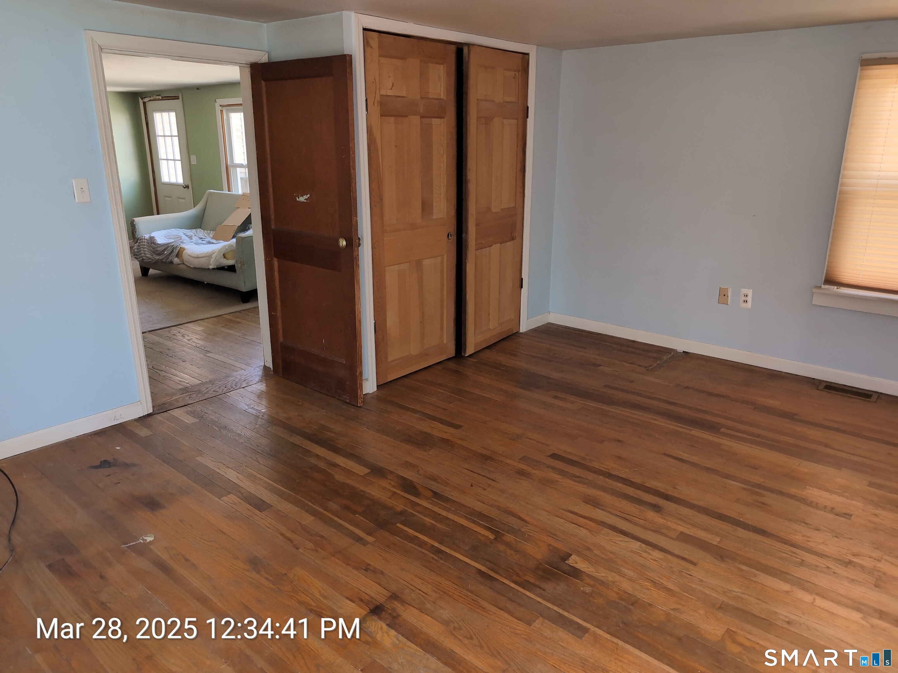 97 Bushy Hill Road Deep River, CT 06417 - Photo 23 of 28 a view of a livingroom from a hallway