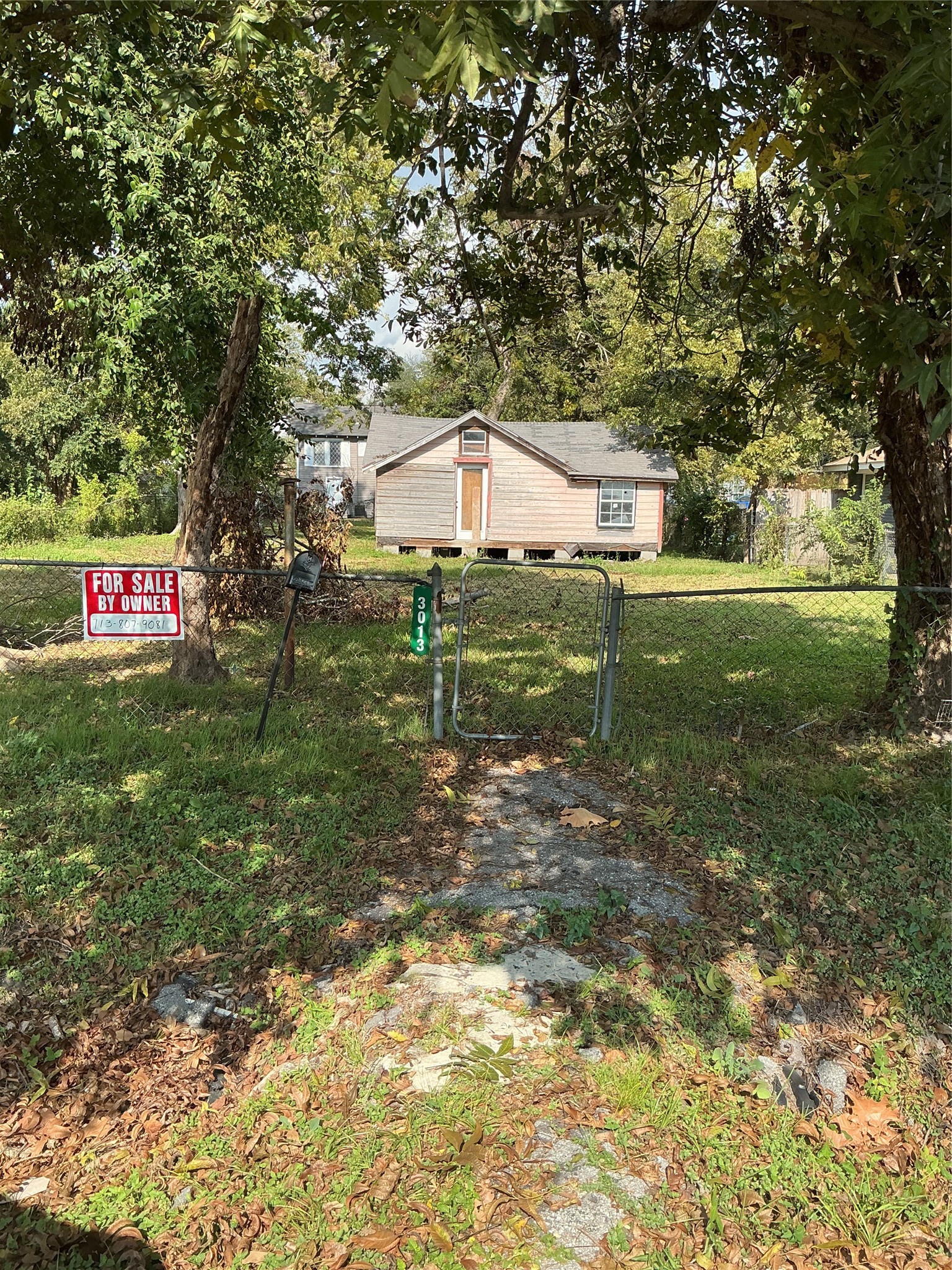 3013 Reid Street Houston, TX 77026 - Photo 3 of 17 a view of a house with a yard