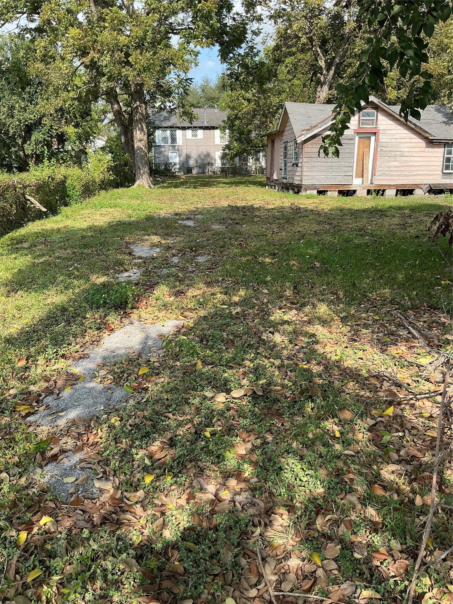 3013 Reid Street Houston, TX 77026 - Photo 5 of 17 a front view of a house with garden