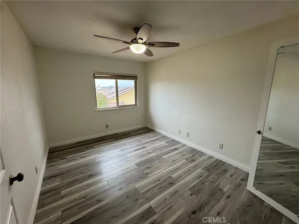 a view of an empty walk in closet