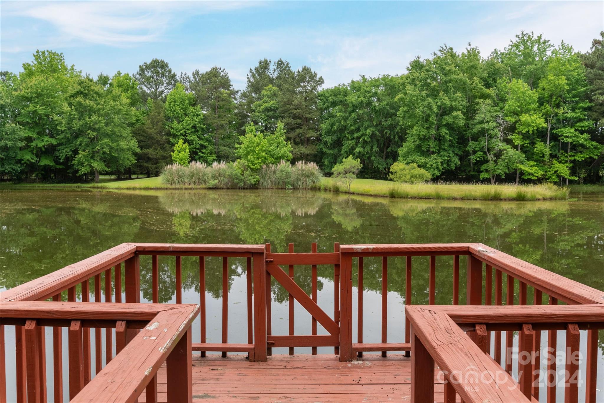 7020 Shelf Road Marshville, NC 28103 - Photo 3 of 45 a view of a wooden deck and yard with green space