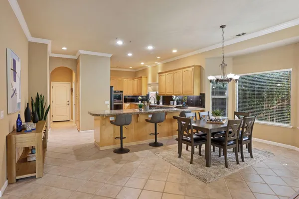 a view of a dining room with furniture