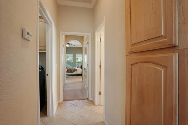 a view of a livingroom from a hallway