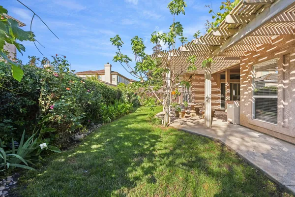 a view of a back yard of the house