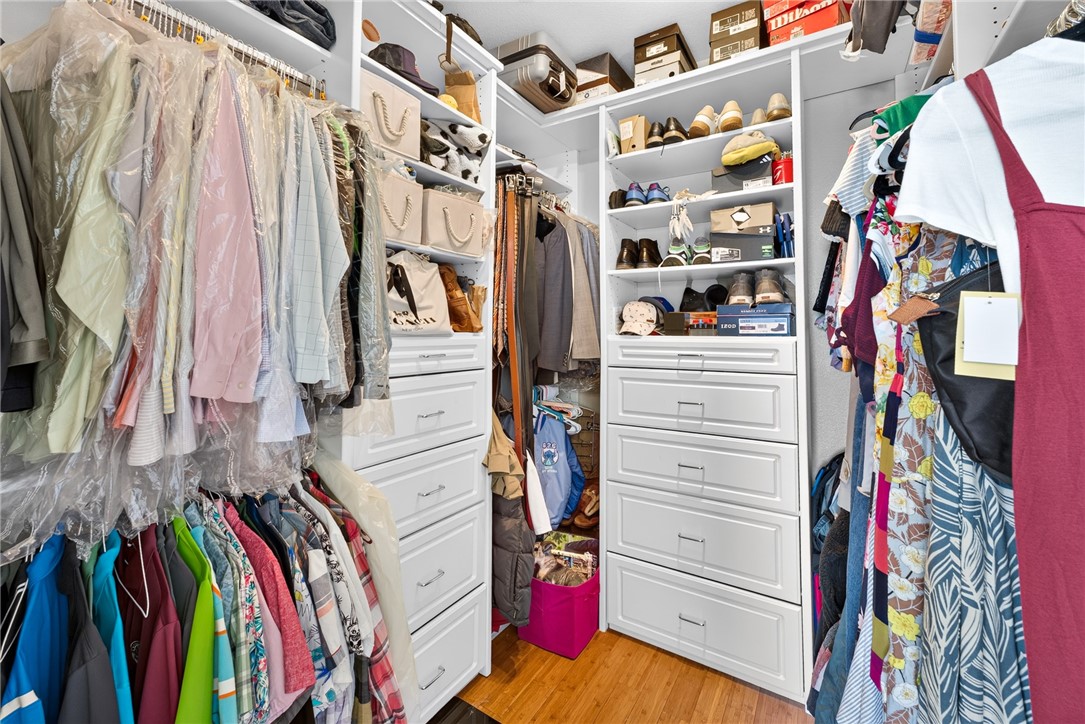 16318 Sun Summit Drive Riverside, CA 92503 - Photo 13 of 47 Primary bedroom walk in closet with organizers 16318 sun summit drive, riverside, california 92503