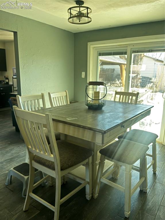 66 Louis Nelson Road Pueblo, CO 81001 - Photo 12 of 29 a view of a dining room with furniture and a window