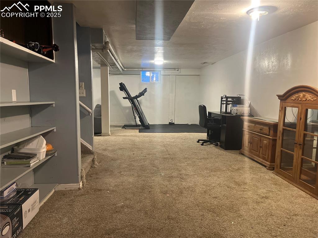 66 Louis Nelson Road Pueblo, CO 81001 - Photo 24 of 29 a view of a room with gym equipment