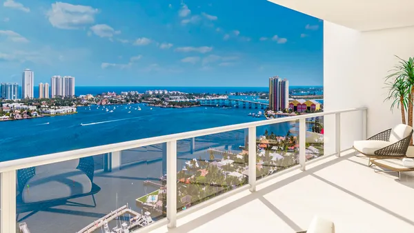 a view of a balcony with an ocean view