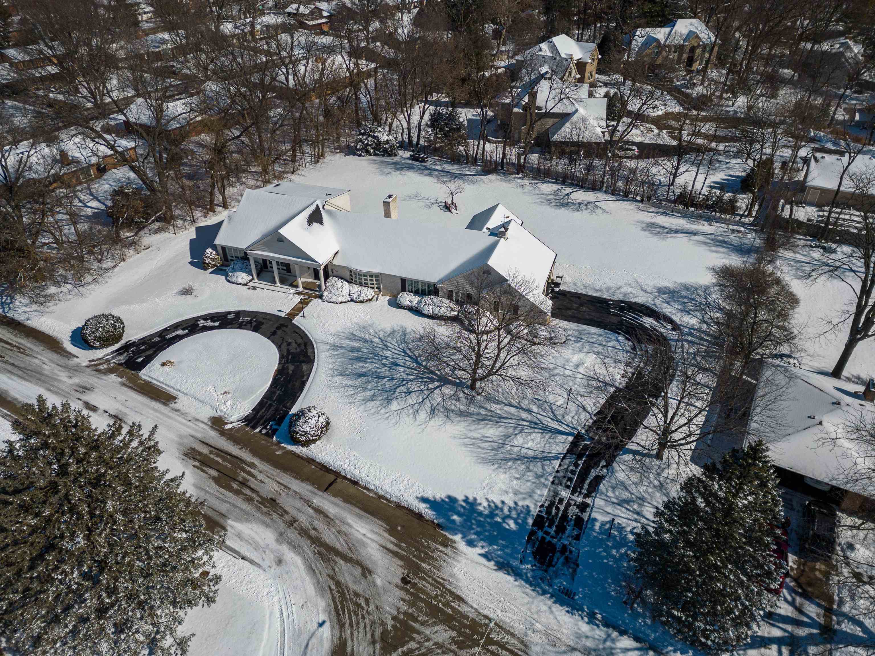 4215 Singleton Road Rockford, IL 61114 - Photo 5 of 45 an aerial view of a house with a yard and parking spaces