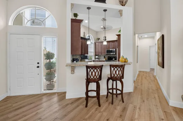 a view of dining room and wooden floor