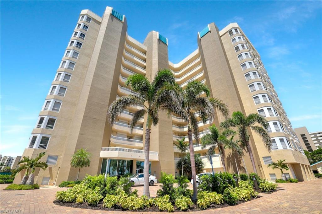 25 Bluebill Avenue, Unit 1103 Naples, FL 34108 - Photo 2 of 22 a front view of a building