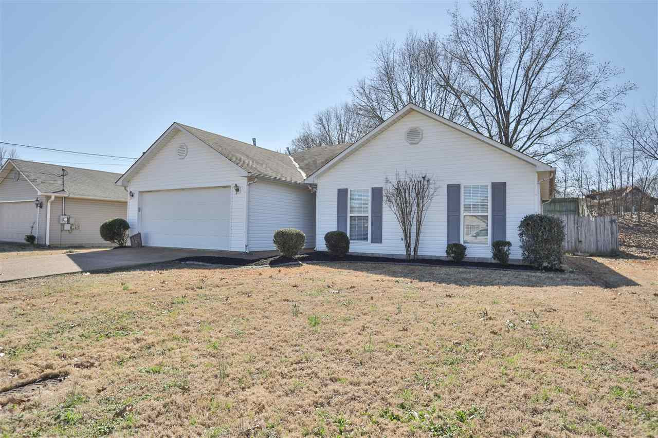 48 Rooker Drive Jackson, TN 38305 - Photo 1 of 1 a view of a house with snow on the road