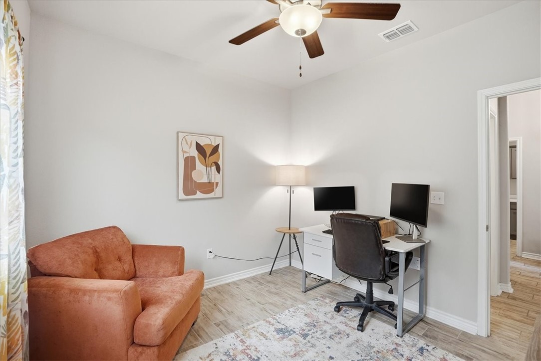 2685 Westeros Street Corpus Christi, TX 78415 - Photo 18 of 24 a workspace with a couch