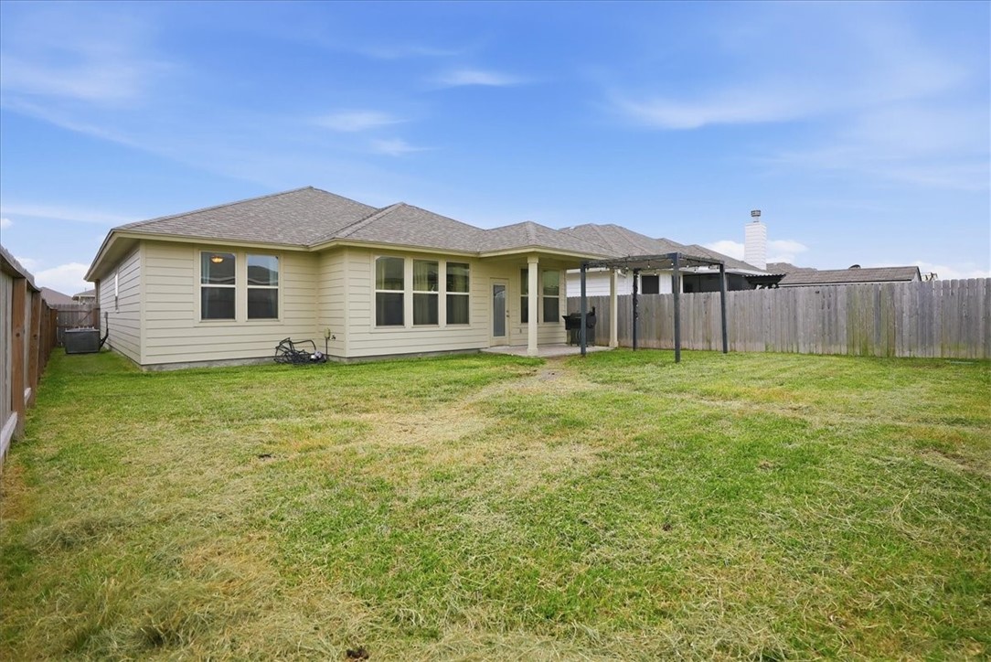 2685 Westeros Street Corpus Christi, TX 78415 - Photo 24 of 24 a front view of a house with a garden