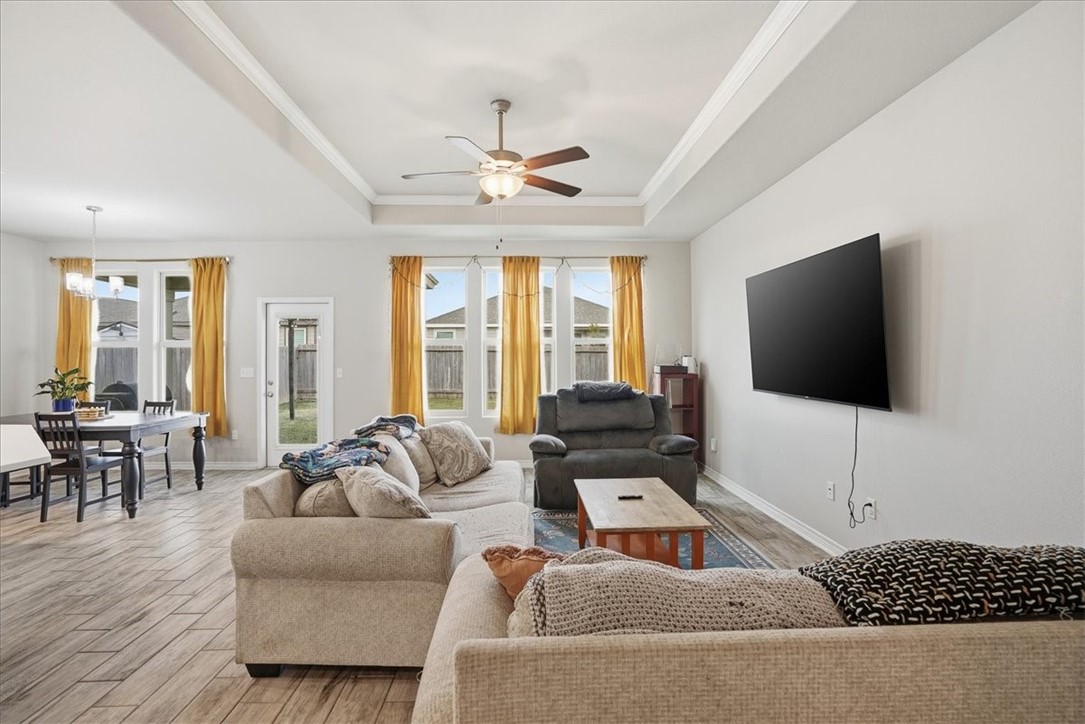 2685 Westeros Street Corpus Christi, TX 78415 - Photo 4 of 24 a living room with furniture and a flat screen tv