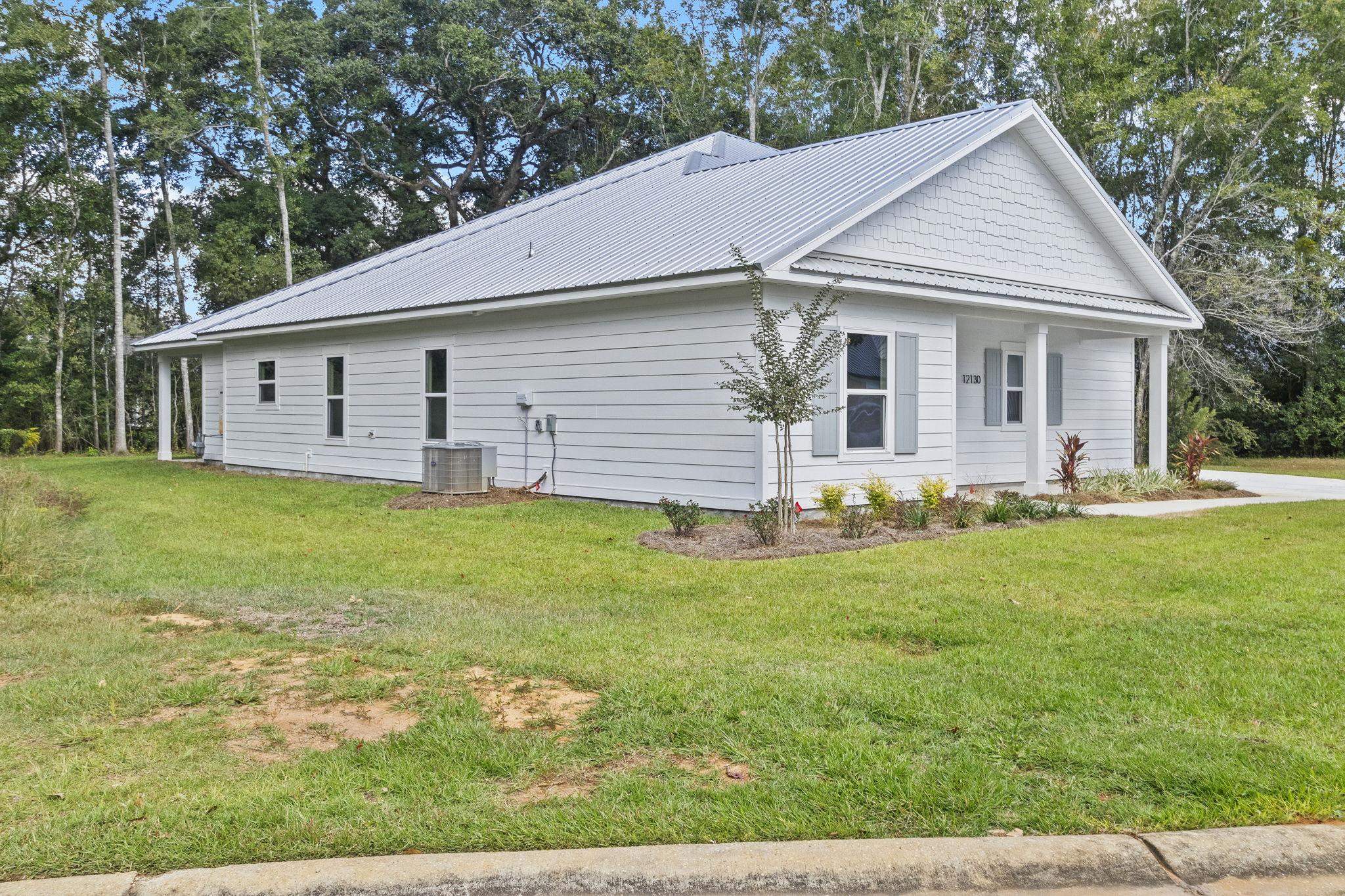 12130 Reunion Place Foley, AL 36535 - Photo 4 of 42 Side Of Structure