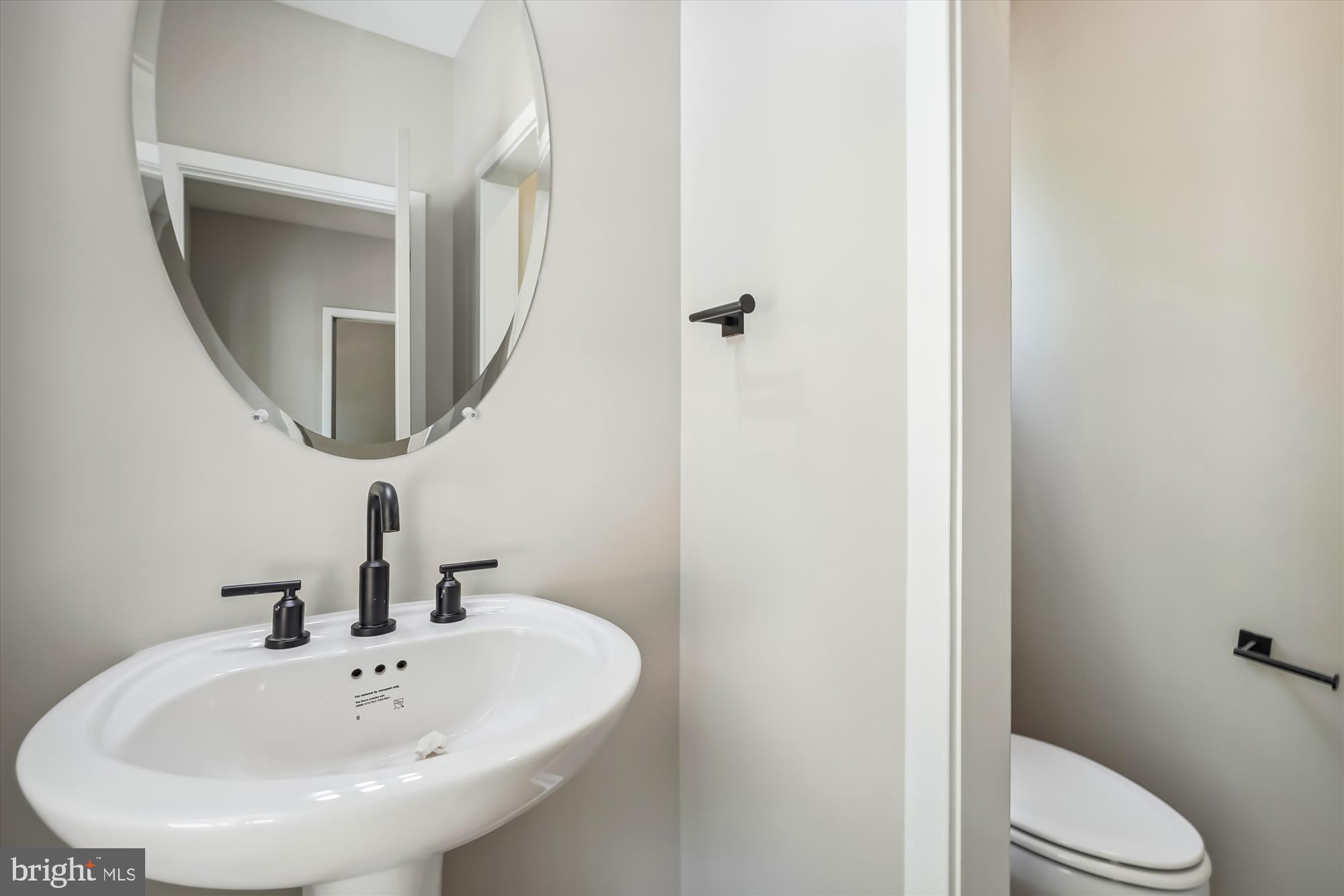 1 Riley Road Warrenton, VA 20187 - Photo 12 of 24 a bathroom with a sink and a mirror
